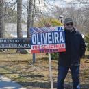 A man campaigns for Al Oliveira at the Council on Aging. 