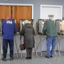 Voters at the Council on Aging fill out their ballots.  Photos by Kat Sheridan