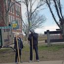 Two people campaign for Nathan Silva outside Town Hall. 