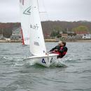 Maisy Sperry and Phoebe Murray lean to steady the boat.