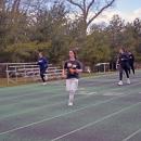 Gabriela Ligotti and Etta Hall lead a group of runners through practice. 