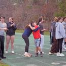 Teammates cheer each other on during 100m trials. 