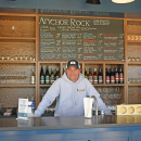 Steve Barwikoski stands at the counter of the tasting room. Photos by Kat Sheridanac