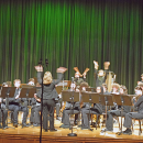 The band encourages the crowd to clap along. 