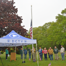 The flag is lowered in memory of the 34 veterans lost from Dartmouth. 