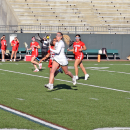 Lily Gangi heads toward the goal with the ball. 
