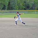 The pitcher throws the ball. 