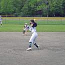 The pitcher throws a ball. 