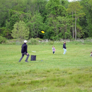 The Kenney family enjoying the lawn games. 
