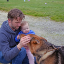 Juliette Summer and her dad meet a dog. 