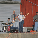 The live band Interzone performs. 