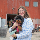 Mackenzie Rubitschung with her dog. 