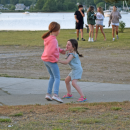 Eliette, 7, and Varou, 5, dance to the music. 