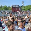 Families capture the moment their family members graduate. 