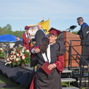 A student hugs a member of the Bishop Stang staff after he received his diploma. 