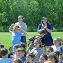 Some students celebrate the opening of the playground. 