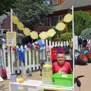 Adrian Rodriguez, age 7, selling lemonade at mhsi mom's yard sale. 