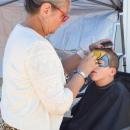 Noah, 5, gets his face painted. 
