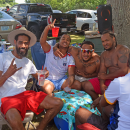 A group of friends poses for a photo. 