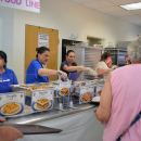 Serving up the food. More photos by Kat Sheridan