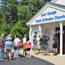 The line wrapped throughout the church and all the way outside. 