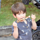 Rafael Pinto, age 3, enjoys a snack. 