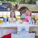 Hannah Nadeau, 5, and Romyn Silva, 4 and a half, sell lemonade to raise money for the shelter. 