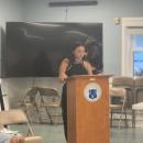 Rachel Dzialo speaks to the crowd. 