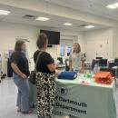 Guests go to the Naloxone training table. 