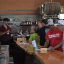 Bikers and friends enjoy drinks at Running Brook Vineyards. 