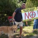 Jeff Rousseau protested with his dog. 