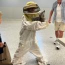 One of the kids tries on the beekeeper suit. Source: Humane Society and Shelter Southcoast Facebook