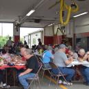 The crowd at Fire District 3 enjoys the pig roast. Photos by Kat Sheridan