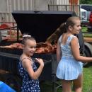 Charlotte O'Connor and Georgia Seland try and get their friend to come look at the whole pig. 