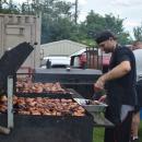 Pig Pickin' working on the chicken. 