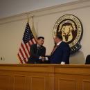 Chester Tam and Henry Bousquet shake hands at the end of the debate. Photos by Kat Sheridan