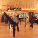 The group dances together. 