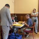 Some of the workers performing the recount in New Bedford. 