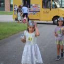 Claire and Ruby, both 5, enjoy some ice cream. 