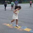 Ellie Sousa, 6, plays hop scotch. 