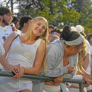 A student dressed in white. 