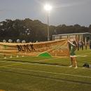 The banner stating the motto of the game, "White out the stands, black out the score board." Photos by Kat Sheridan