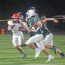 Chace Powers runs for a touchdown. 
