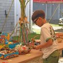 Daniel, 9, explores some of the prizes. 