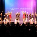  19 contestants during the opening number with outgoing titleholders Addison Kohler and Deolinda Mendes. Source: Ashley Bendiksen