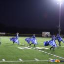 The color guard escapes from the cage. 