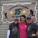 Commissioners Courtney Cohen and Nicole Mello pose with Sherri Tetrault. Photos by Kat Sheridan