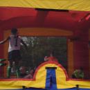 The kids enjoyed the bounce house. 