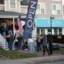 A crowd formed outside Padanaram Outfitters for a drink. 