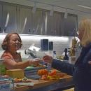Quiggs hands out samples of cheeses. 